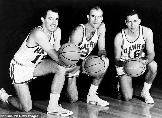 Richie Guerin (left), Bob Pettit (center) and Cliff Hagan of the St. Louis Hawks pose in 1955