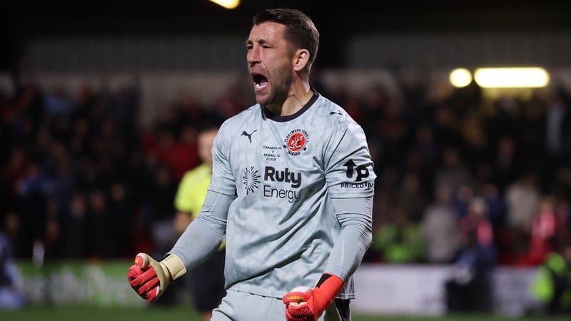 FLEETWOOD, ENGLAND - OCTOBER 27: Jay Lynch of Fleetwood Town celebrates saving Arsenal's fourth penalty taken by Bruno Guimaraes in the penalty shootout during the Carabao Cup Fourth Round match between Fleetwood Town and Arsenal at Highbury Stadium on Oc