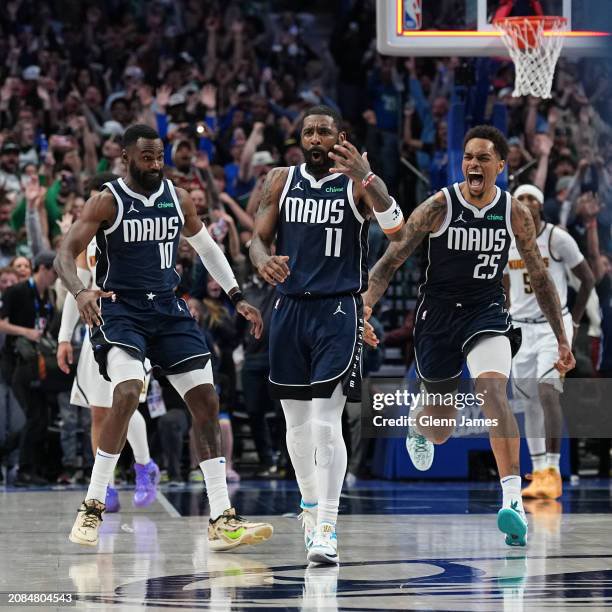 Dallas tx kyrie irving of the dallas mavericks celebrates during the game after scoring the