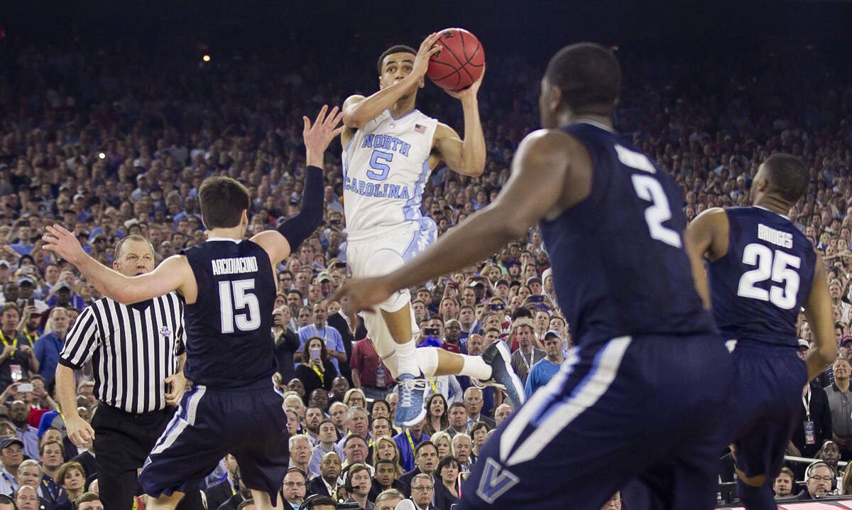 North Carolina's Marcus Paige (5) said he first thought this double-clutching shot in the 2016 national title game was off target. “It looked like it was going left a little bit,” he said.