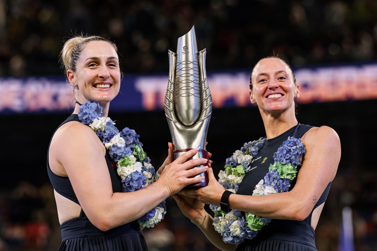 WUHAN, CHINA - OCTOBER 18: Luisa Stefani of Brazil and Gabriela Dabrowski of Canada pose with the champions trophy after defeating Storm Hunter of Australia and Katerina Siniakova of the Czech Republic in the Women's Doubles Final on Day 7 of the Wuhan Open at Optics Valley International Tennis Center on October 18, 2026 in Wuhan, Hubei Province of China. (Photo by VCG/VCG via Getty Images)
