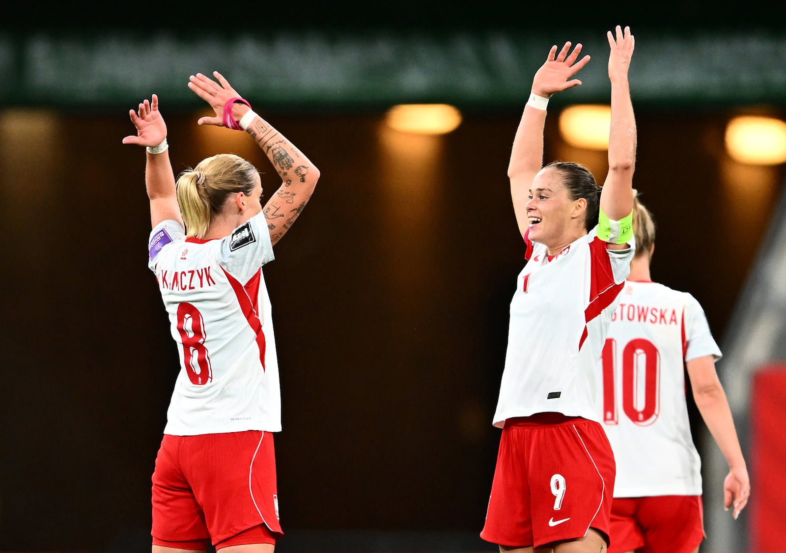 Poland star player and captain Ewa Pajor, right, celebrates scoring against Belgium on Tuesday, Photograph: Mateusz Slodkowski/Getty