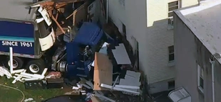 Tractor-trailer driver barrels into back of New Jersey home