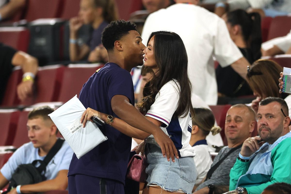 COLOGNE, GERMANY - JUNE 25: Ollie Watkins of England interacts with partner Ellie Alderson in the stand at full-time following the team's draw in the UEFA EURO 2024 group stage match between England and Slovenia at Cologne Stadium on June 25, 2024 in Cologne, Germany. (Photo by Richard Pelham/Getty Images)