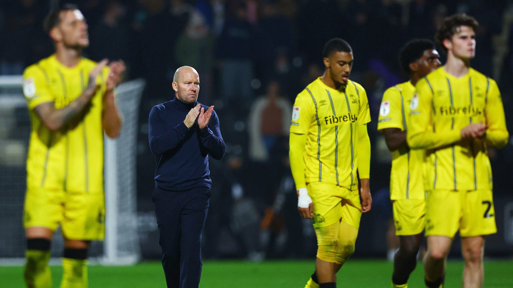 Henrik Pedersen and his Sheffield Wednesday players applaud the fans after their game away at Notts County on Tuesday
