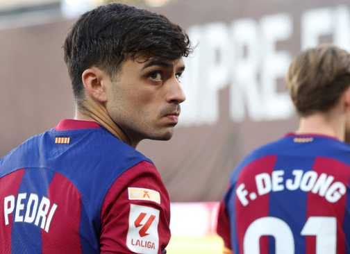 Pedri looks on