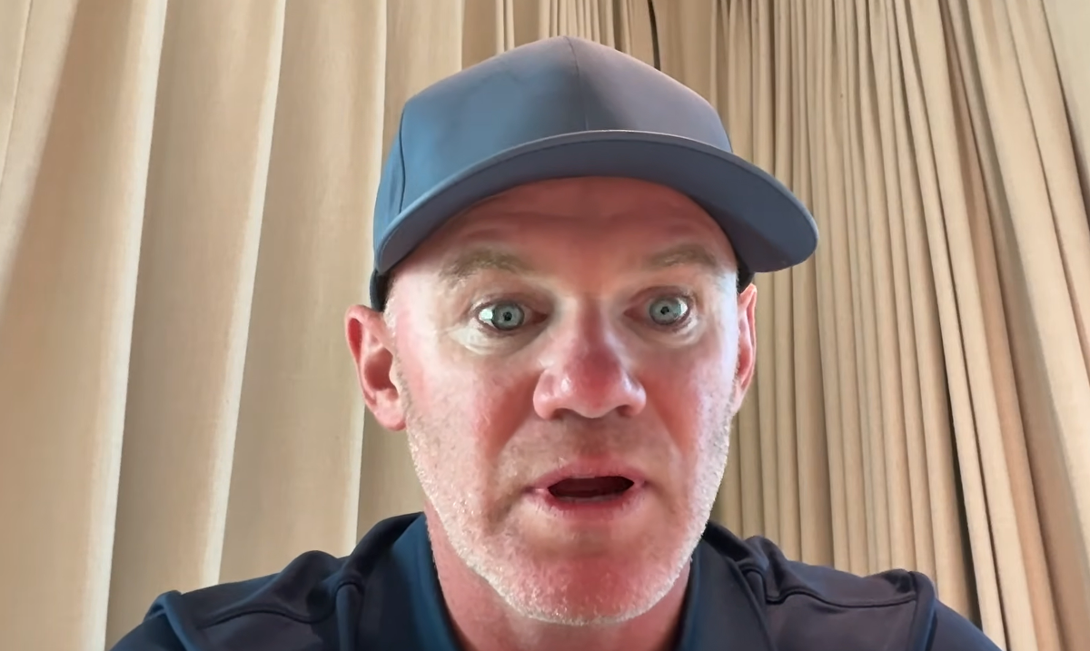 Wayne Rooney speaking into a camera