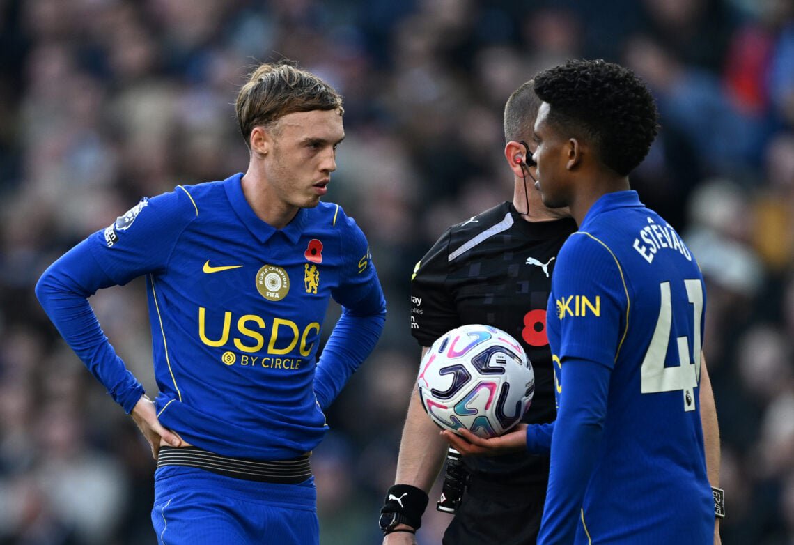 Estevao of Chelsea hands the ball to teammate Cole Palmer