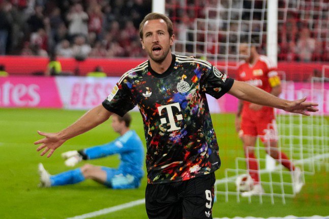 Bayern's Harry Kane celebrates after scoring his side's fourth goal during the Bundesliga soccer match between Bayern Munich and 1. FC Union Berlin in Munich, Germany, Friday, Sept. 18, 2026. (AP Photo/Matthias Schrader)
