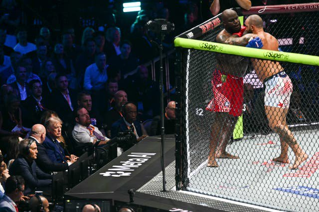 Josh Hokit (right) stopped Derrick Lewis at the White House, as President Donald Trump watched on