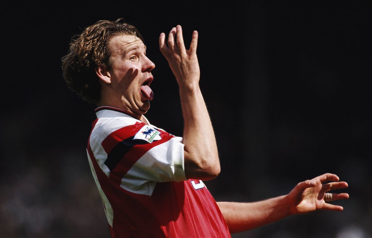 Arsenal player Paul Merson partakes in a drinking celebration after the FA Cup semi final win against Tottenham Hotspur at Wembley Stadium