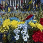 A precious moment in time of war: Flowers for a wife and daughter coming home to Ukraine