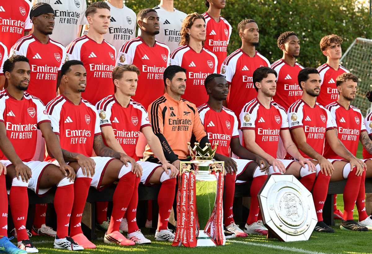 LONDON COLNEY, ENGLAND - OCTOBER 14: (L-R) Jurrien Timber, Noni Madueke, Gabriel Magalhaes, Viktor Gyokeres, Martin Odegaard, Cristhian Mosquera, Mikel Arteta (Manager), Riccardo Calafiori, Bukayo Saka, Ezri Konsa, Declan Rice, Myles Lewis-Skelly, Mikel Merino, Max Dowman and Ben White of Arsenal during the Arsenal Men's team squad photo at Sobha Realty Training Centre on October 14, 2026 in London Colney, England. (Photo by David Price/Arsenal FC via Getty Images)