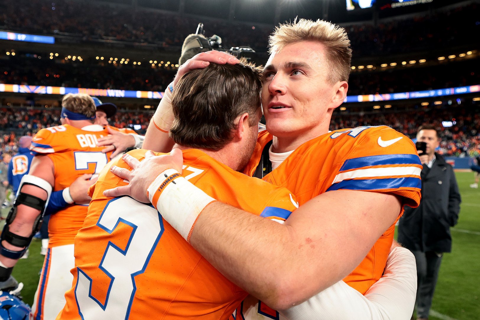 Bo Nix 10 and Wil Lutz 3 of the Denver Broncos celebrate after defeating the Seattle Seahawks in overtime of the game at Empower Field At Mile High on October 15, 2026 in Denver, Colorado. 