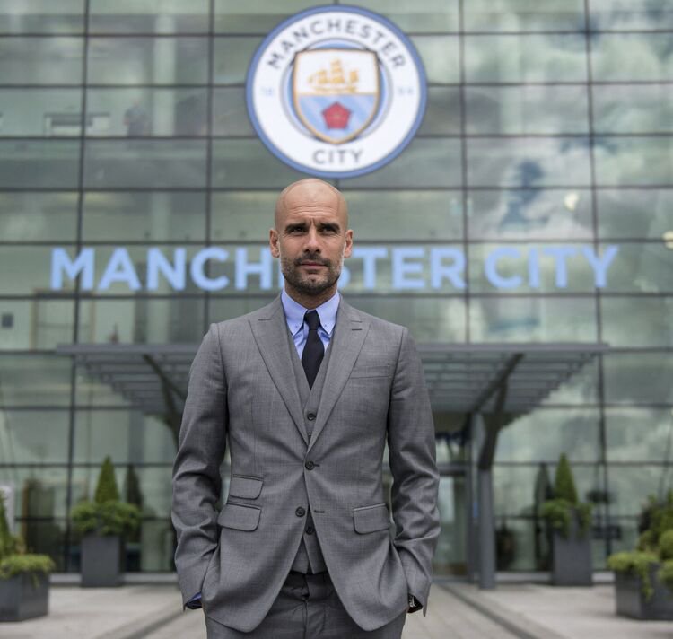 TOPSHOT-FBL-ENG-PR-MAN-CITY-GUARDIOLA