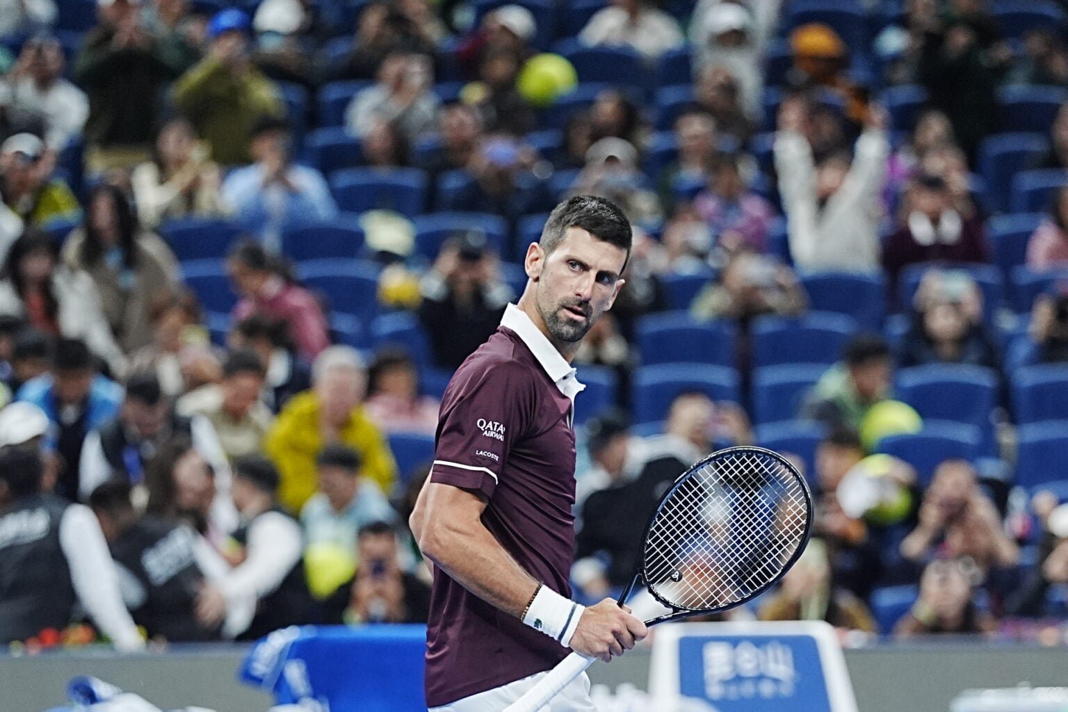 Novak Djokovic looks on at the China Open.