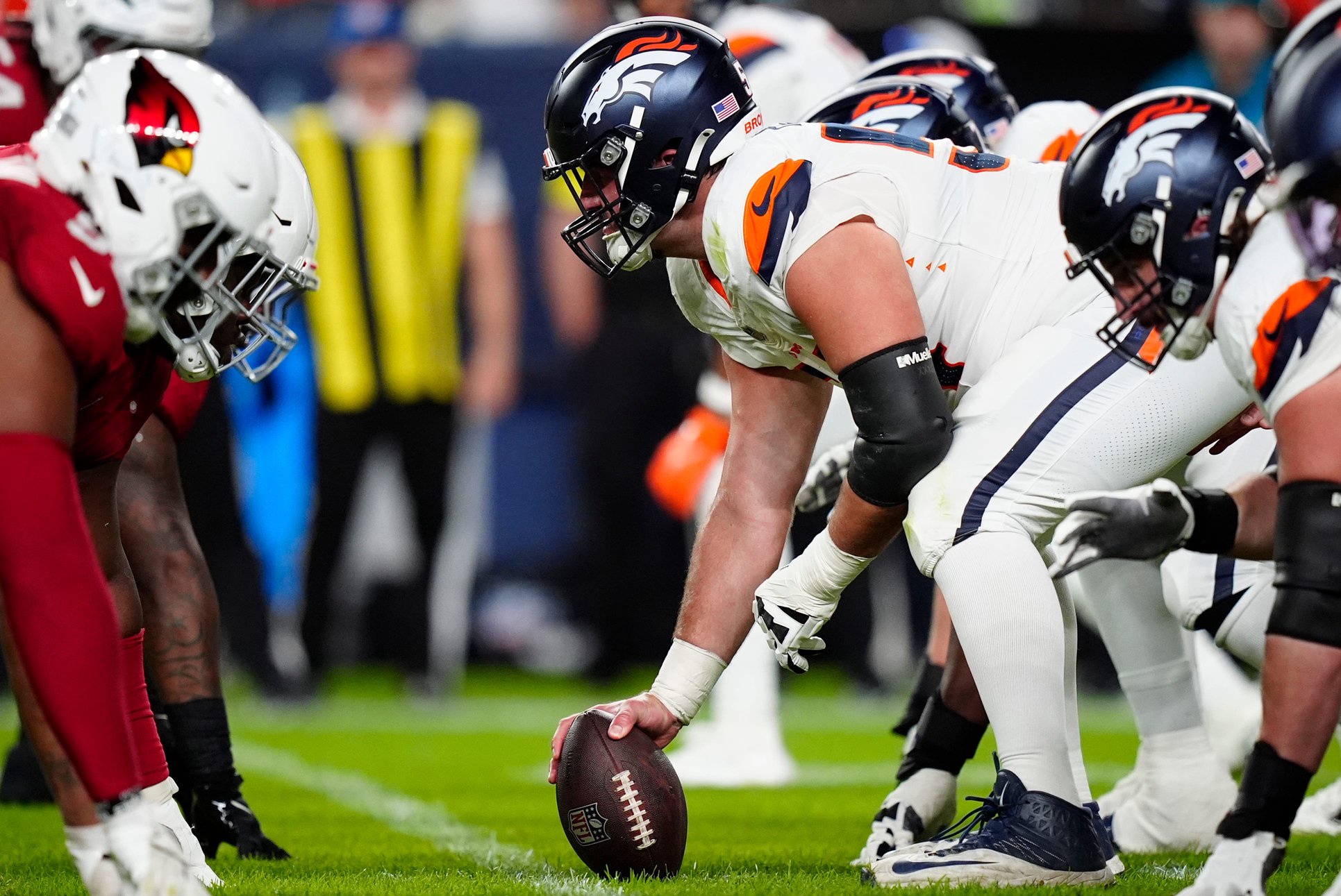 Aug 16, 2025; Denver, Colorado, USA; Denver Broncos center Alex Forsyth (54) lines up across from the Arizona Cardinals during the second quarter at Empower Field at Mile High. Mandatory Credit: Ron Chenoy-Imagn Images
