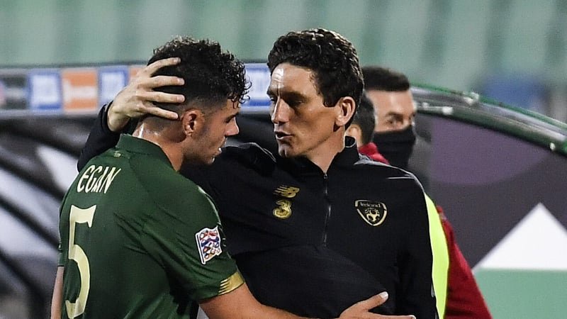 Keith Andrews greets John Egan