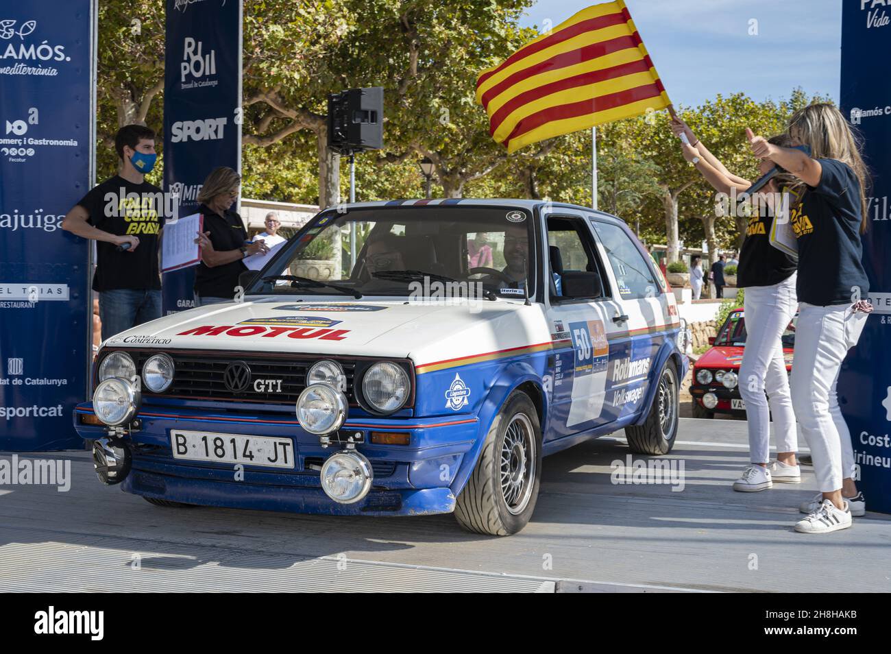 Palamos spain nov a closeup of a white volkswagen golf gti at the xviii costa brava historic rally in palamos spain