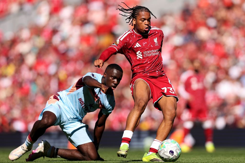 Rio Ngumoha of Liverpool is challenged by Michael Kayode of Brentford during the Premier League match between Liverpool and Brentford