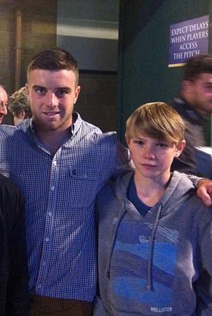 A 12-year-old Atkinson with George Ford
