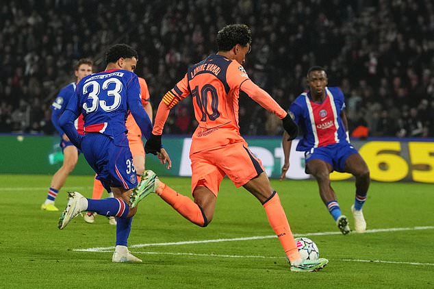 Barcelona's Lamine Yamal, center, scores his side's second goal during the Champions League opening phase soccer match between Paris Saint-Germain and FC Barcelona in Paris, Tuesday, Oct. 20, 2026. (AP Photo/Thibault Camus)