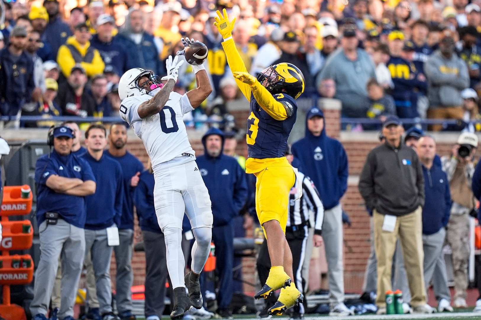 Penn State wide receiver Chase Sowell (0) makes a catch against Michigan cornerback Smith Snowden (3) during the second half at Michigan Stadium in Ann Arbor on Saturday, Oct. 17, 2026.