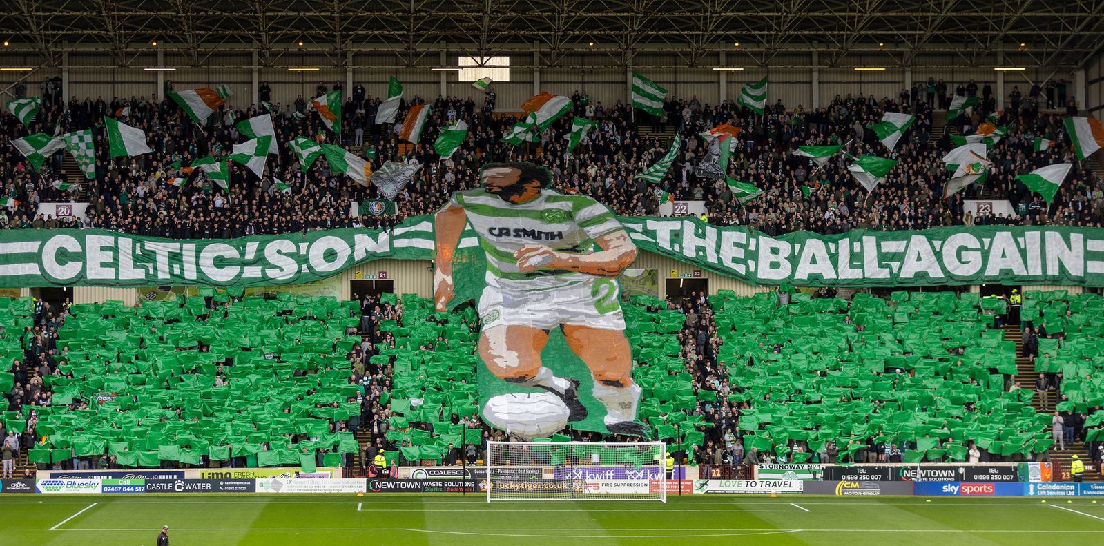 Celtic fans display a giant tifo in tribute to Danny McGrain at Fir Park