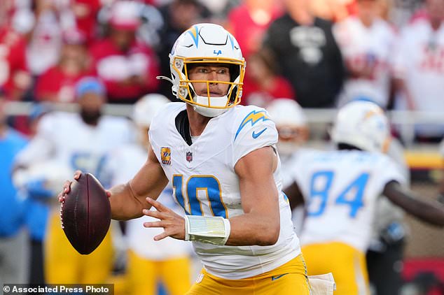 Los Angeles Chargers quarterback Justin Herbert (10) throws a pass during the second half of an NFL football game against the Kansas City Chiefs in Kansas City, Mo., Sunday, Oct. 18, 2026. (AP Photo/Ed Zurga)