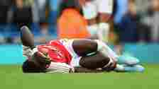 epa11253430 Arsenal's Bukayo Saka recovers after a clash during the English Premier League match between Manchester City and Arsenal in Manchester, Britain, 31 March 2024. EPA/PETER POWELL EDITORIAL USE ONLY. No use with unauthorized audio, video, data, fixture lists, club/league logos, 'live' services or NFTs. Online in-match use limited to 120 images, no video emulation. No use in betting, games or single club/league/player publications.