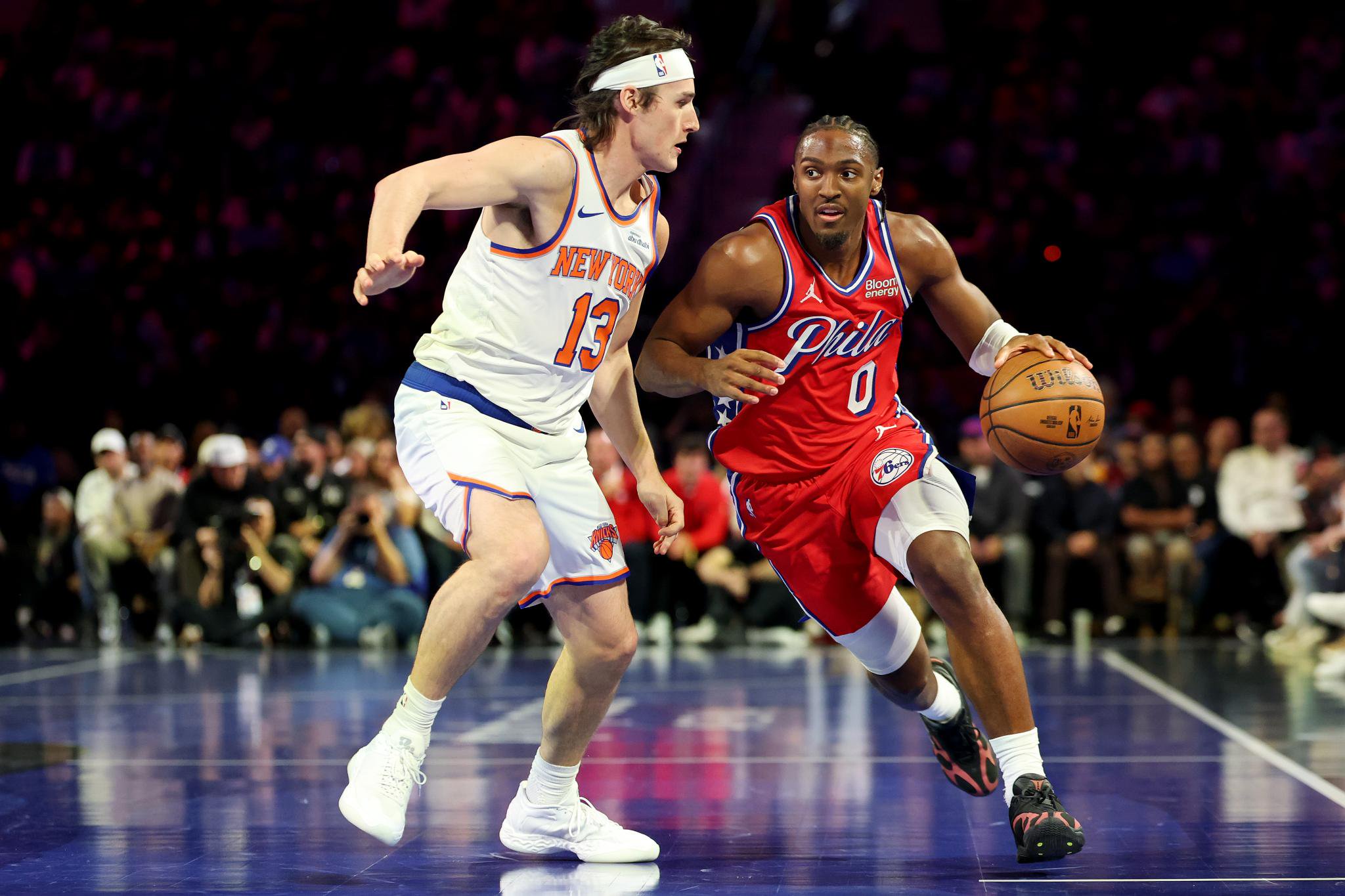 Tyrese Maxey of the Philadelphia 76ers dribbles the ball past Ryan Arcidiacono of the New York Knicks.