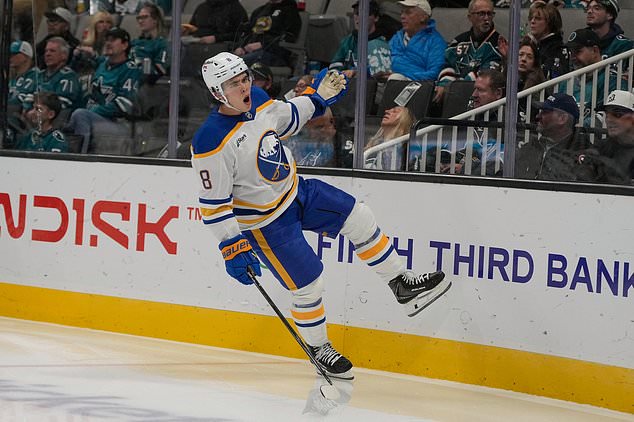 Buffalo Sabres defenseman Olen Zellweger (8) celebrates after scoring against the San Jose Sharks during the second period of an NHL hockey game, Tuesday, Oct. 27, 2026, in San Jose, Calif. (AP Photo/Jeff Chiu)