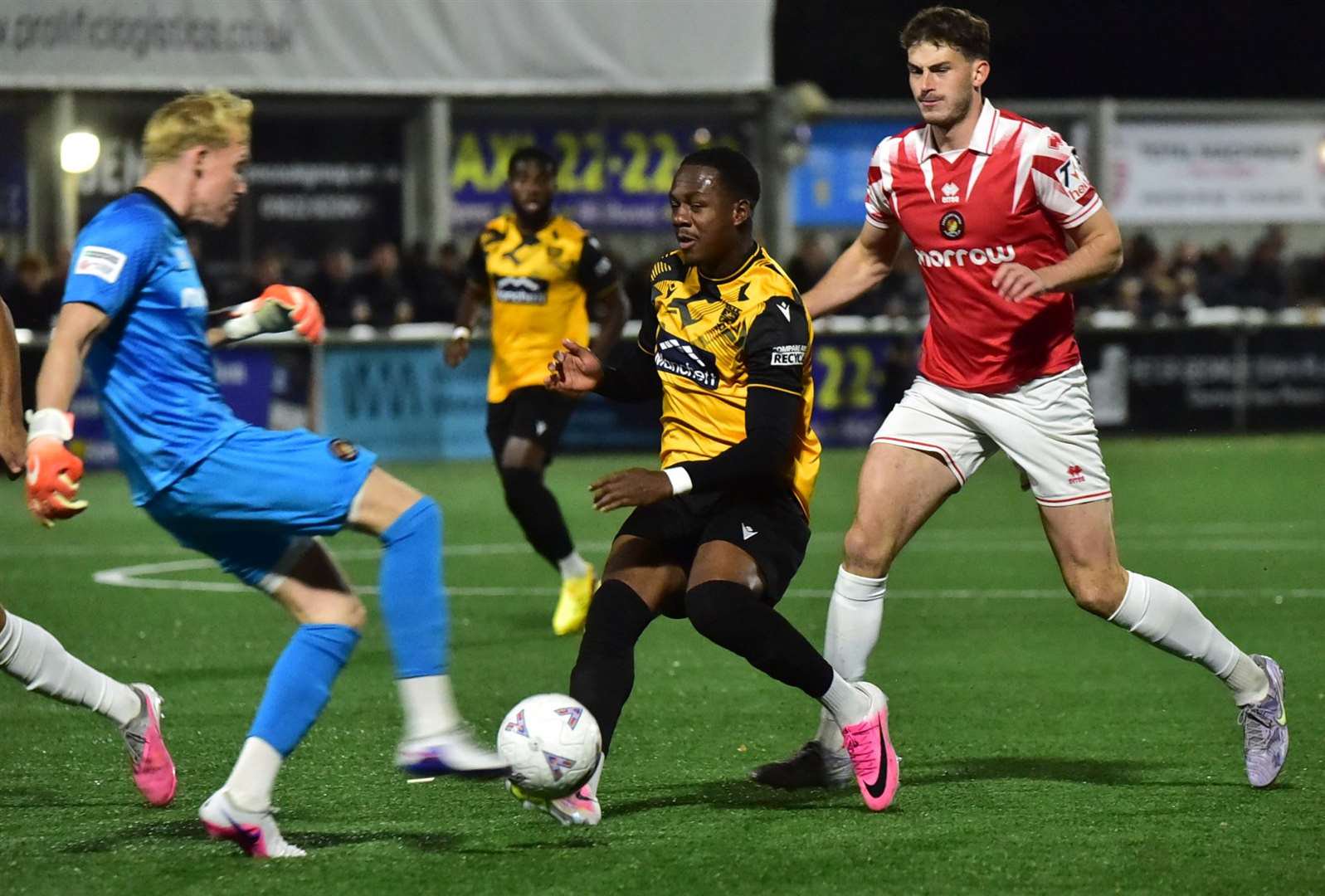 Ken Charles puts Ebbsfleet goalkeeper Will Buse under pressure at the Gallagher. Picture: Steve Terrell