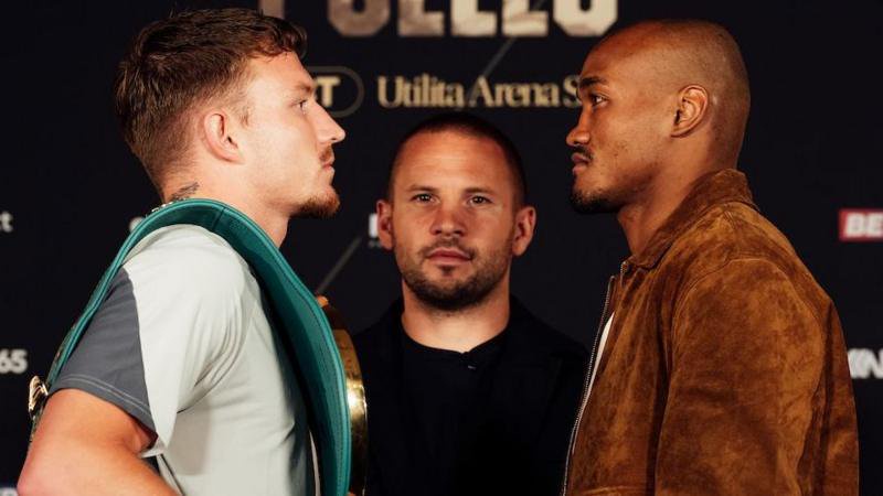 Dalton Smith has the WBC light-welterweight title over his shoulder as he stares at Alberto Puello