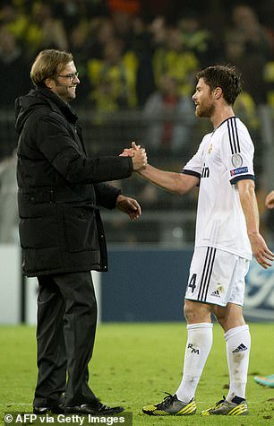 When Jurgen Klopp (left) announced his Liverpool exit in 2024, many expected Alonso to be the next manager at Anfield