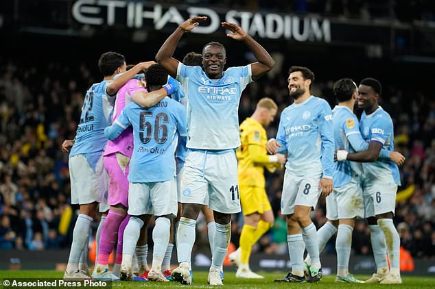 Manchester City players celebrate at the end of the English League Cup soccer match between Manchester City and Brighton and Hove Albion in Manchester, England, Wednesday, Oct. 28, 2026. (AP Photo/Dave Thompson)