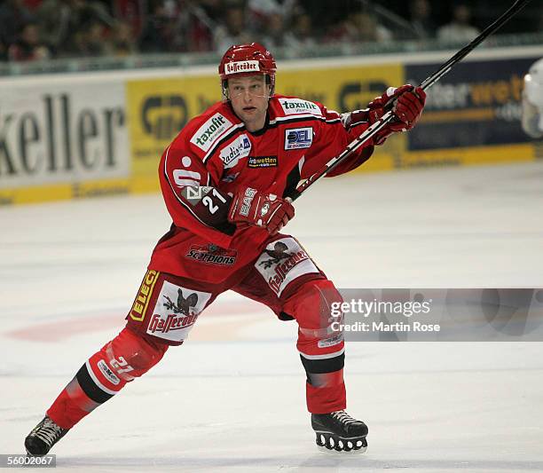 Hanover germany patrik augusta of hanover runs with the puck during the bundesliga game between