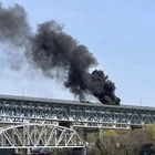 Driver charged with negligent homicide in fiery crash that shut down Connecticut highway bridge