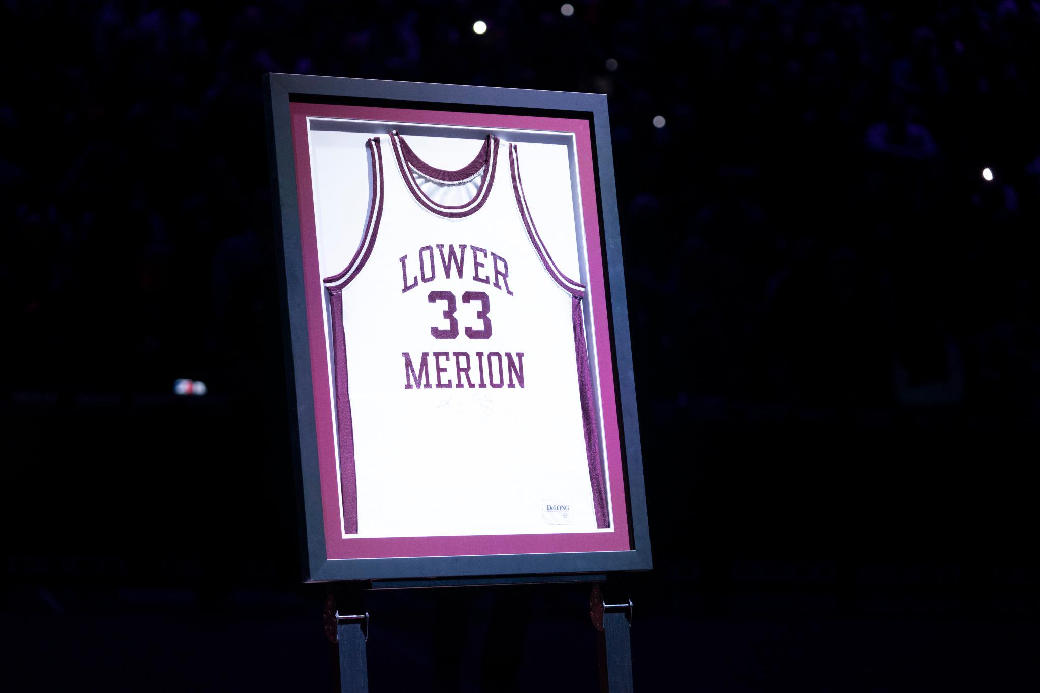 Framed Lower Merion High School basketball jersey with number 33.