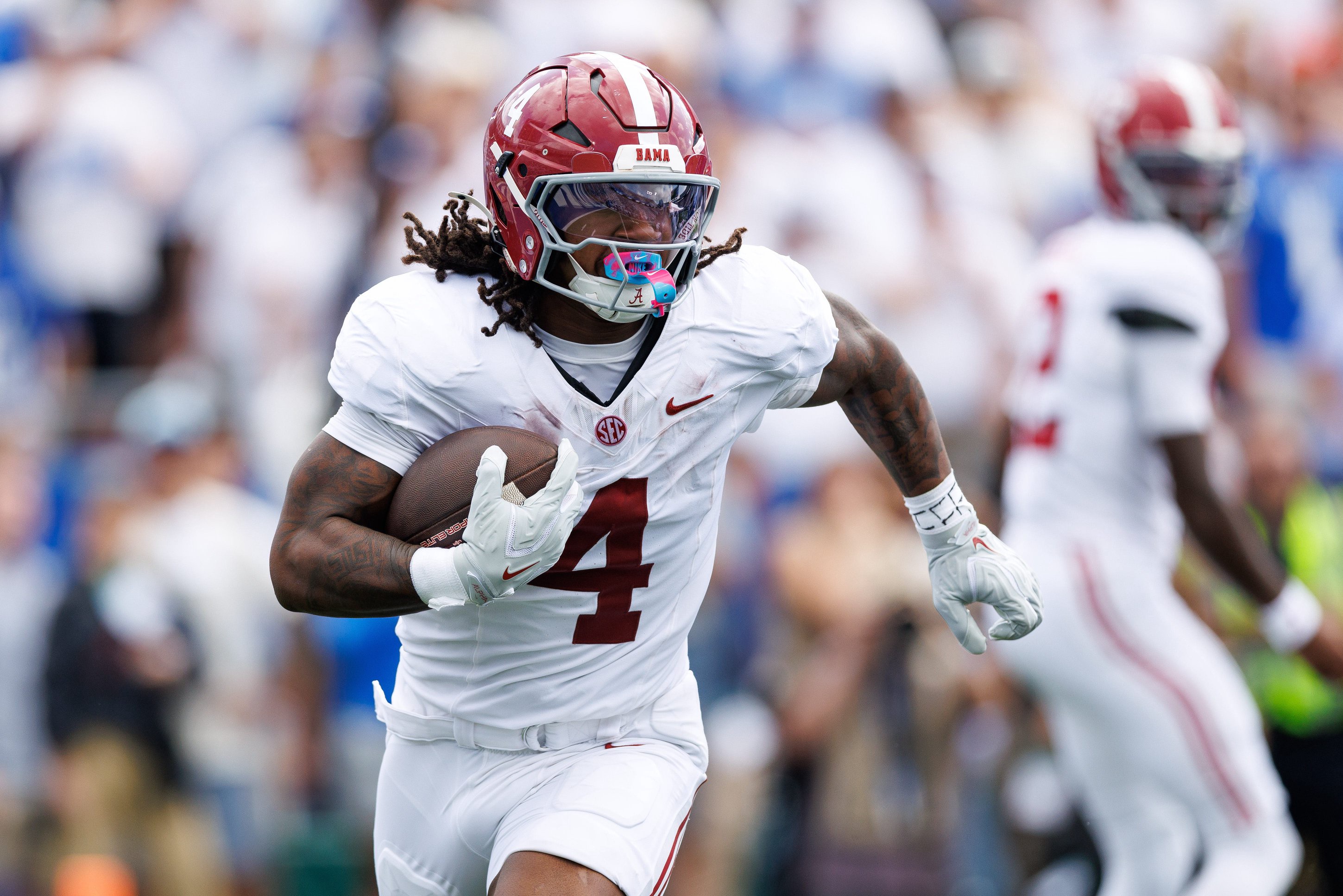 Sep 12, 2026; Lexington, Kentucky, USA;  Alabama Crimson Tide running back Daniel Hill (4) runs the ball during the first quarter against the Kentucky Wildcats at Kroger Field.  Mandatory Credit: Jordan Prather-Imagn Images