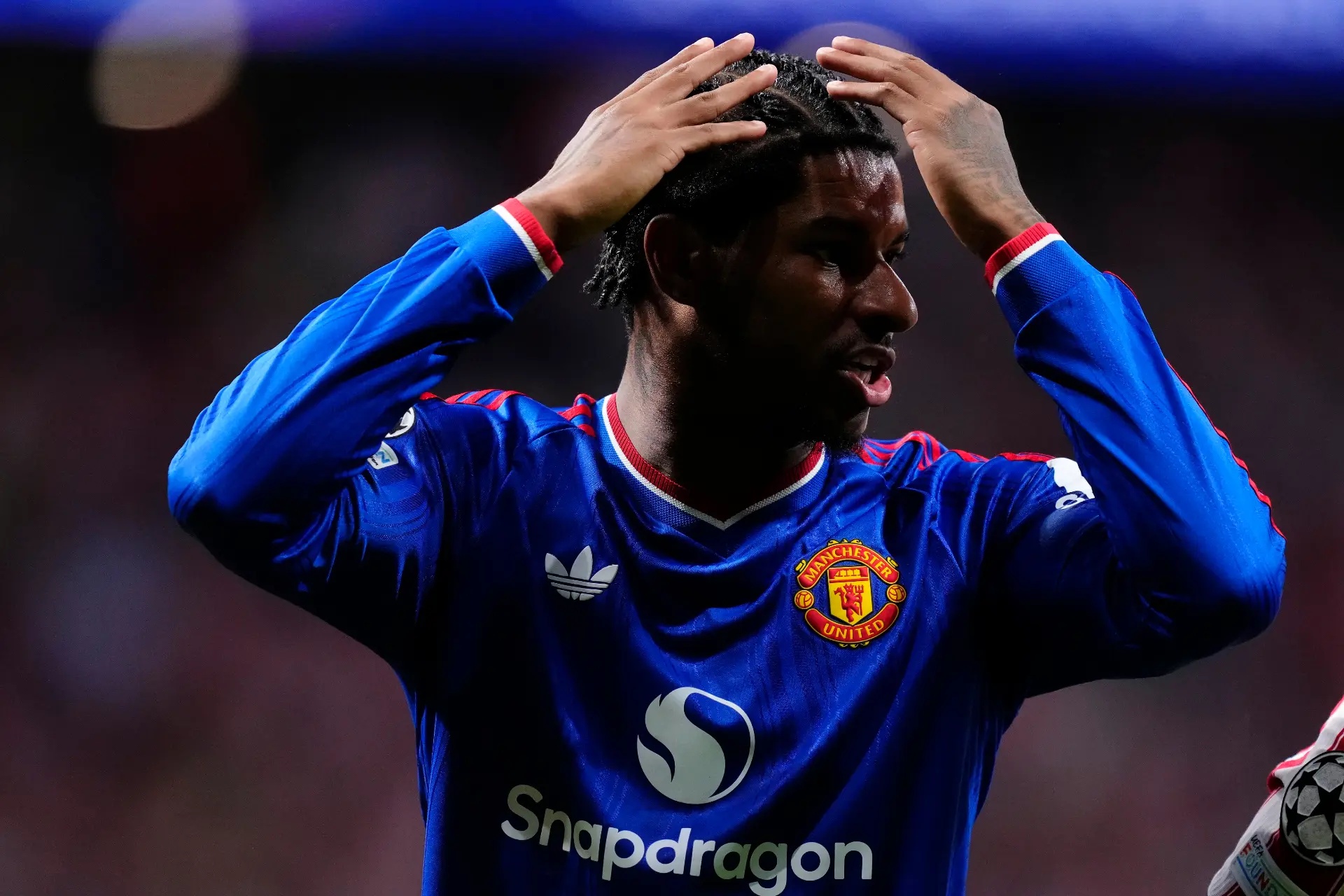 Marcus Rashford looking upset.
