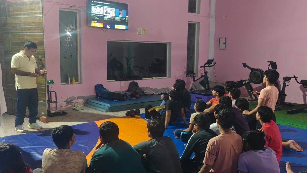 Trainees at Kuldeep Malik Sport Academy in Sonepat get ready for Kajal's bout. (Express Photo by Pritish Raj)