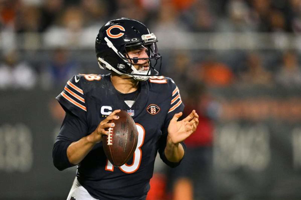 Oct 22, 2026; Chicago, Illinois, USA; Chicago Bears quarterback Caleb Williams (18) looks to pass against the New England Patriots during the fourth quarter at Soldier Field. © Patrick Gorski-Imagn Images