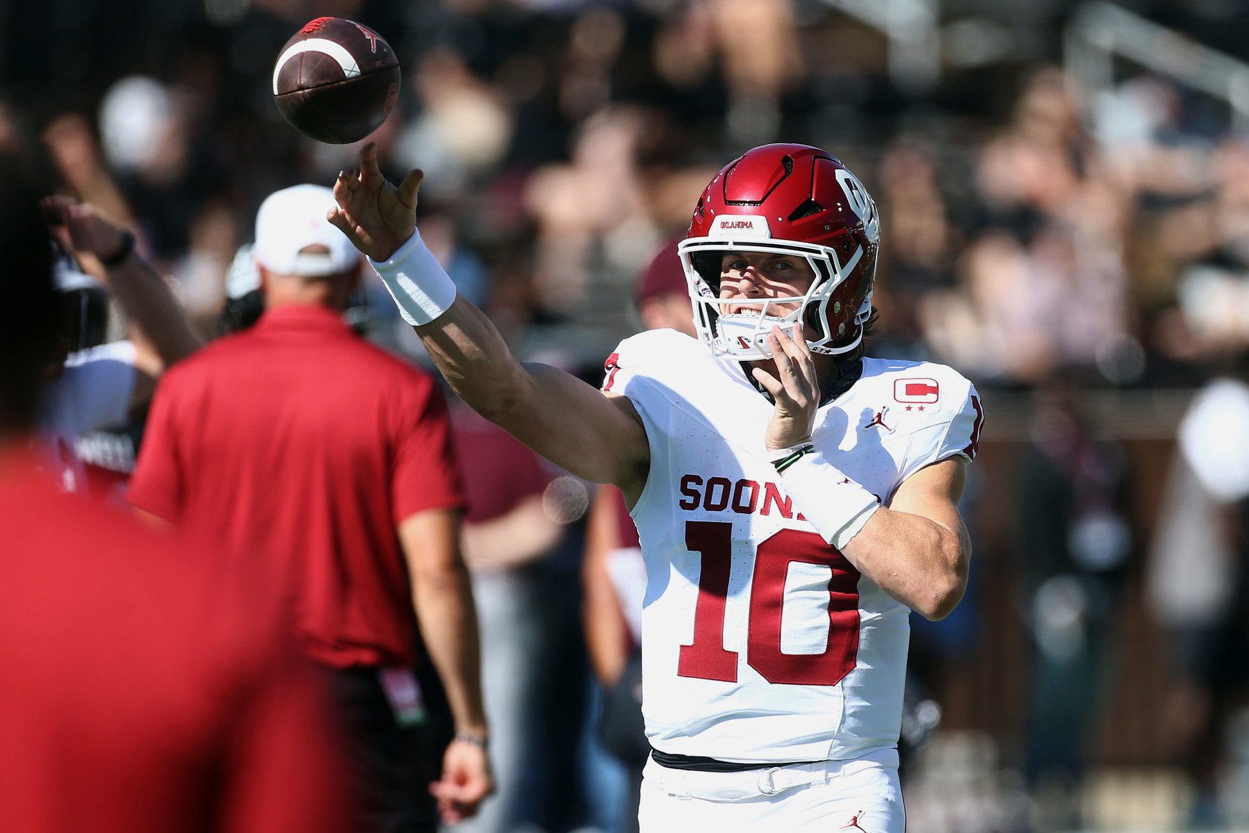 Oct 24, 2026; Starkville, Mississippi, USA;  Oklahoma Sooners quarterback John Mateer (10) passes the ball during warm ups prior to the game against the Mississippi State Bulldogs at Davis Wade Stadium at Scott Field.  Mandatory Credit: Petre Thomas-Imagn Images
