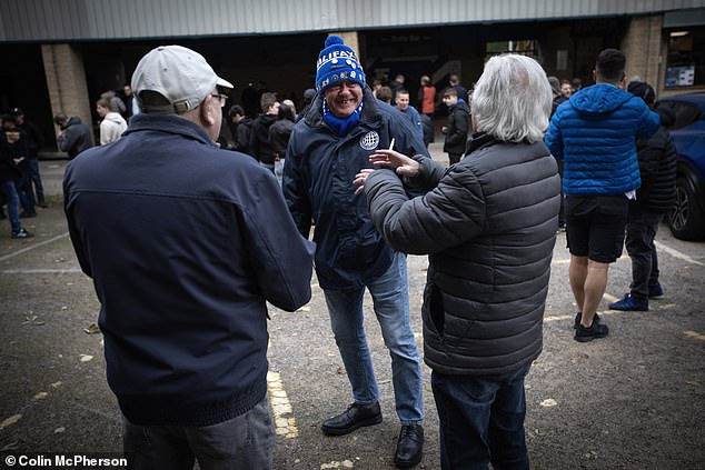 Home supporters enjoying a chat during the half-time break as Halifax beat South Shields 3-2