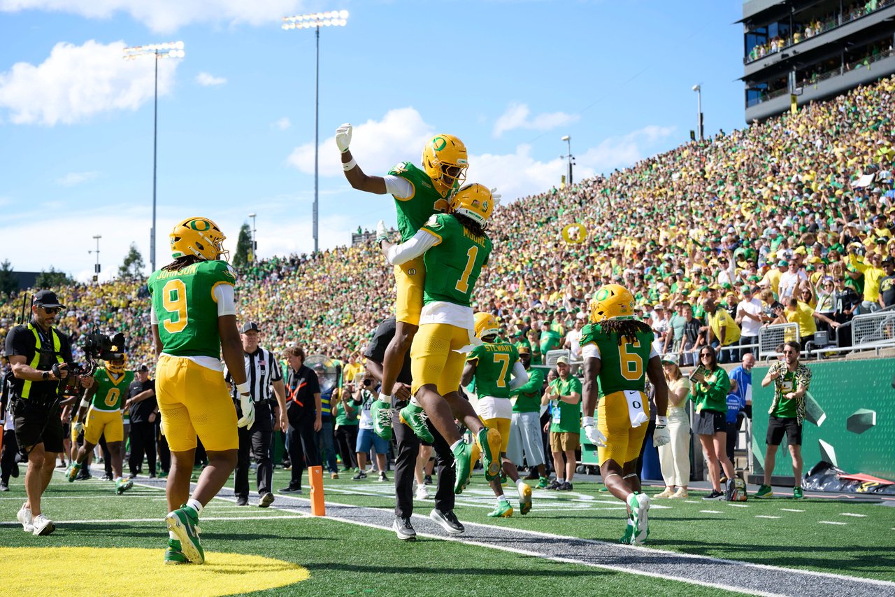 Sep 5, 2026; Eugene, Oregon, USA; Oregon Ducks wide receiver Dakorien Moore (1) celebrates scoring a touchdown with wide receiver Jeremiah McClellan (3) during the second half against the Boise State Broncos at Autzen Stadium. Mandatory Credit: Troy Wayrynen-Imagn Images