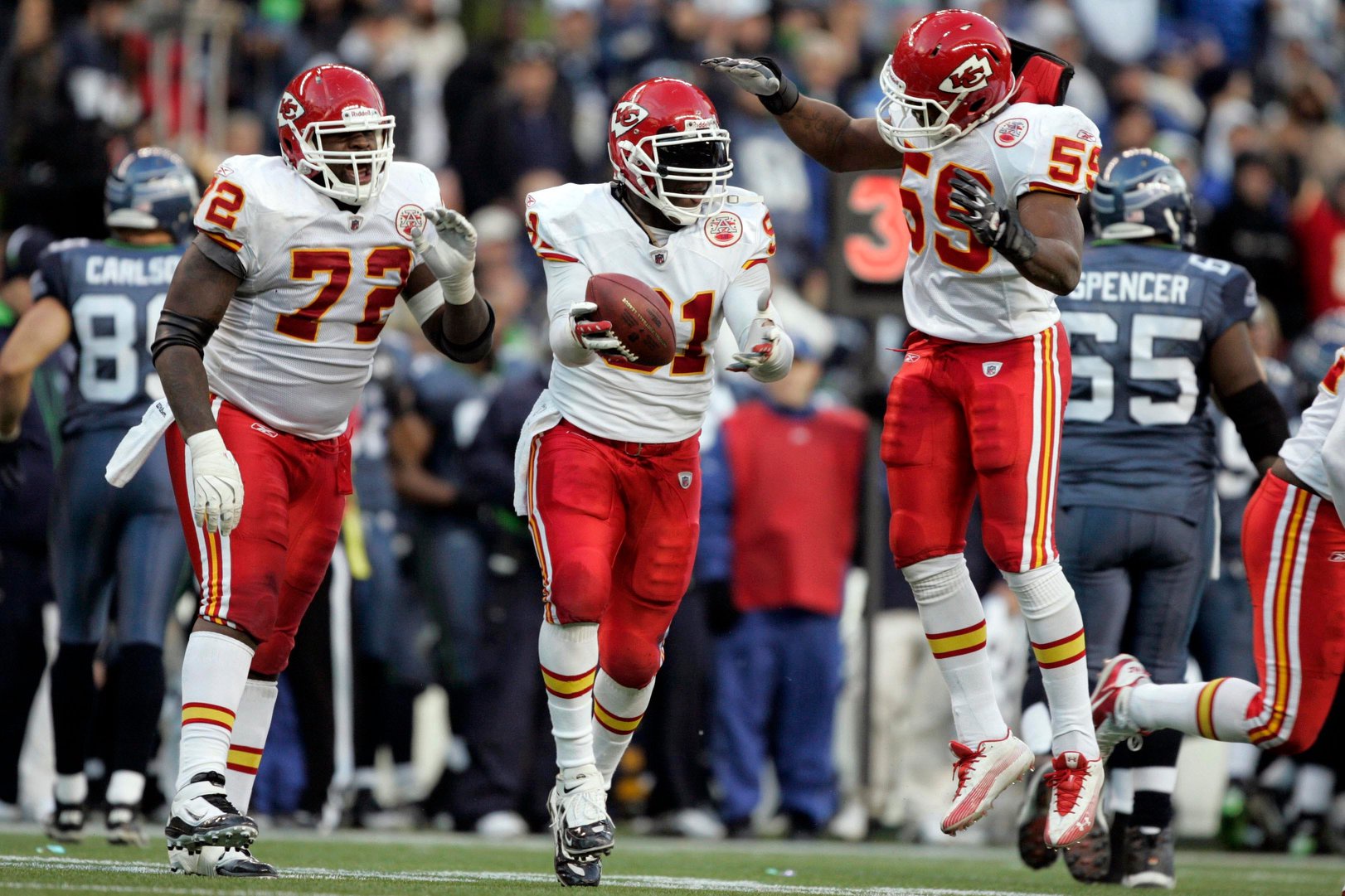 November 28, 2010, Seattle, WA USA; Kansas City Chiefs linebacker Tamba Hali (91) celebrates a fumble recovery against the Seattle Seahawks with defensive end Glenn Dorsey (71) and linebacker Jovan Belcher (59) during the second half at Qwest Field. Kansas City defeated Seattle, 42-24. Mandatory Credit: Joe Nicholson-USA TODAY Sports