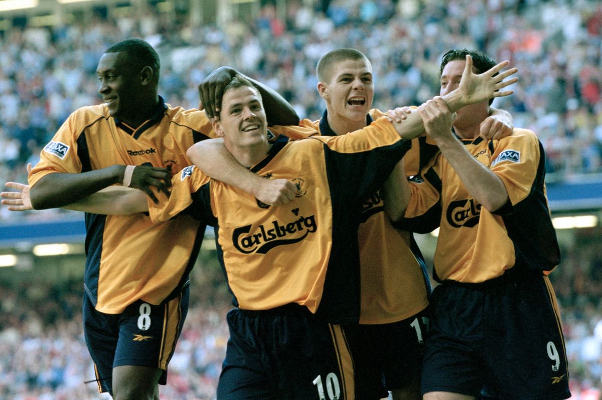 Michael Owen of Liverpool celebrates with team mates Emile Heskey (left), Steven Gerrard (right) and Robbie Fowler (far right) after scoring during the FA Cup Final against Arsenal