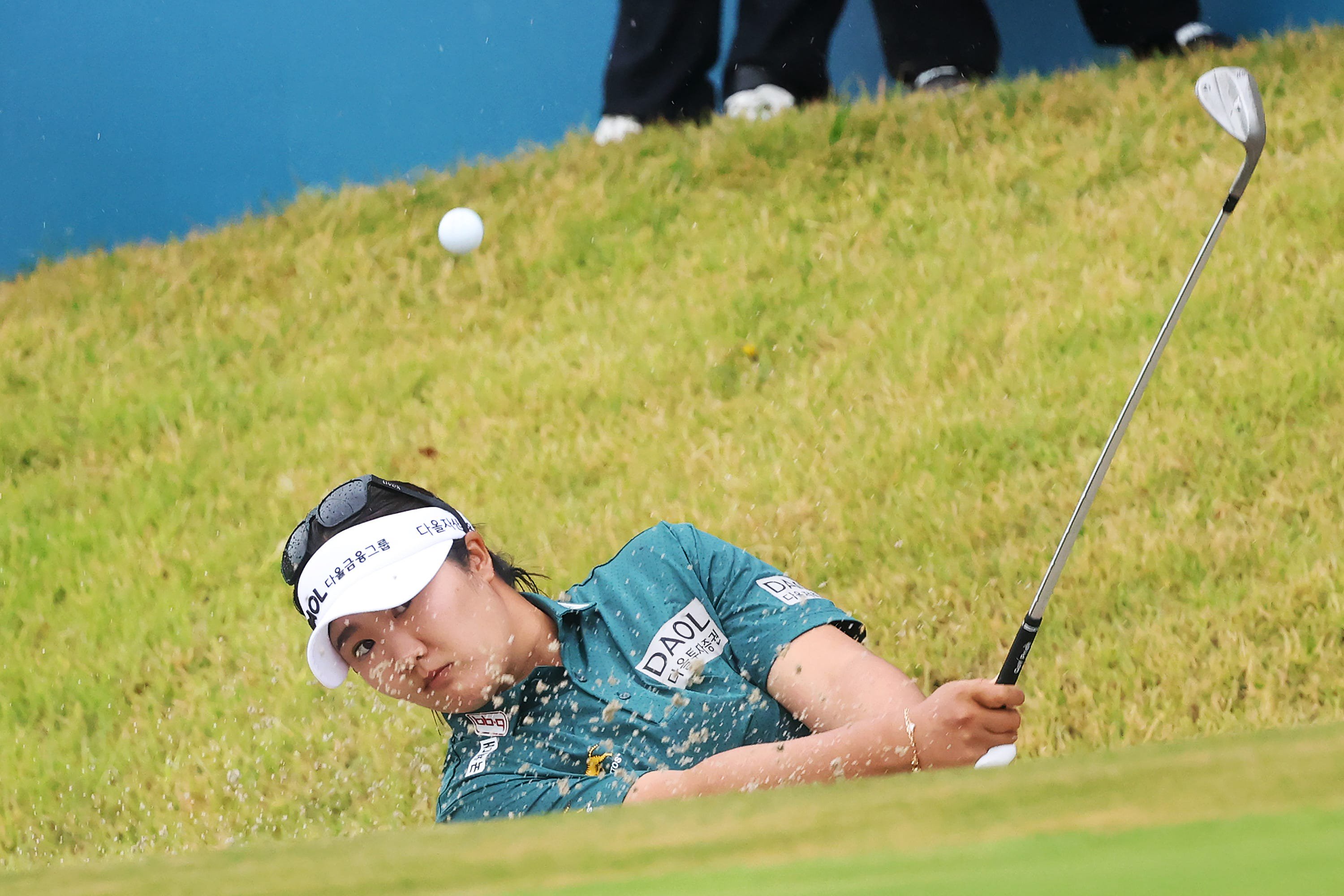 Haeran Ryu of South Korea chips out of a bunker onto the 18th green during the final round of the BMW Ladies Championship 2026 at Pine Beach Golf Links on October 25, 2026 in Haenam, South Korea.