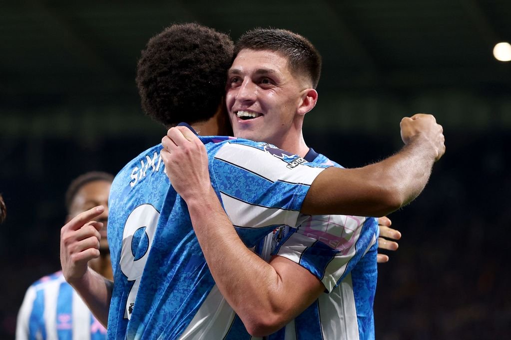 Ellis Simms of Coventry City (left) celebrates with teammate Bobby Thomas after scoring their side's third goal of the game